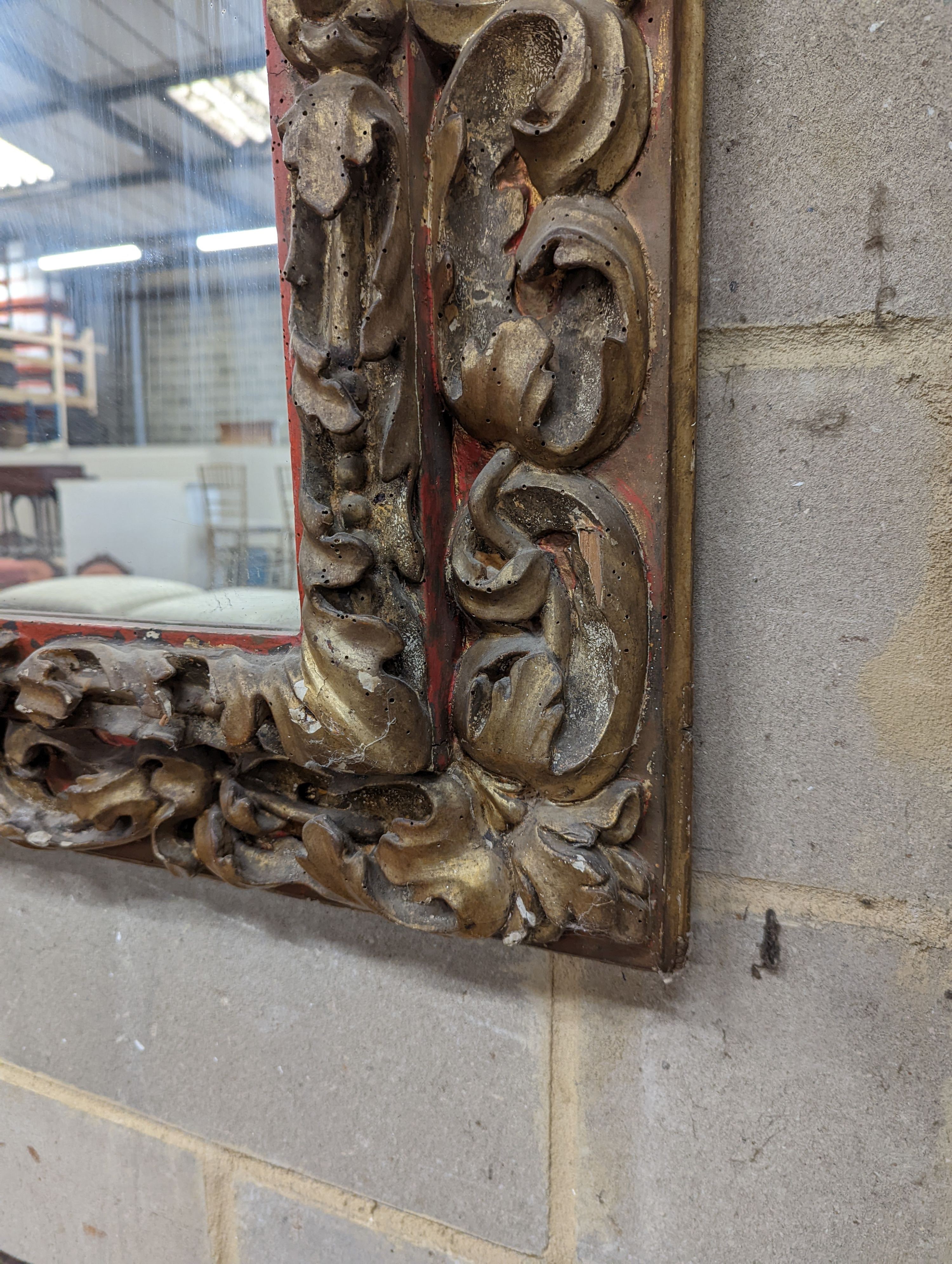 A 19th century carved giltwood rectangular wall mirror, width 140cm, height 76cm
